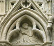 Panel 04:06 - Seated man reading closely from a book